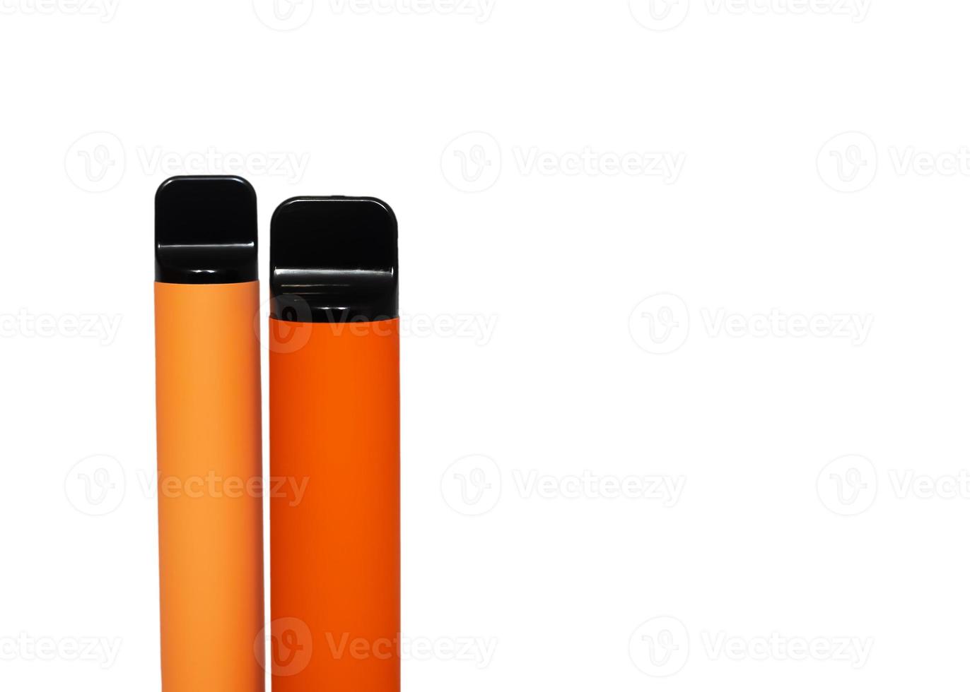 two disposable e-cigarettes. The concept of modern smoking, vaping and nicotine. Top view photo
