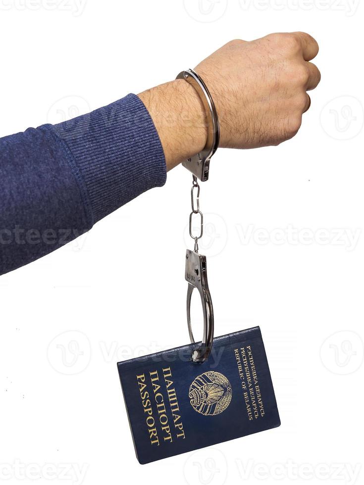 Belarusian passport in handcuffs photo