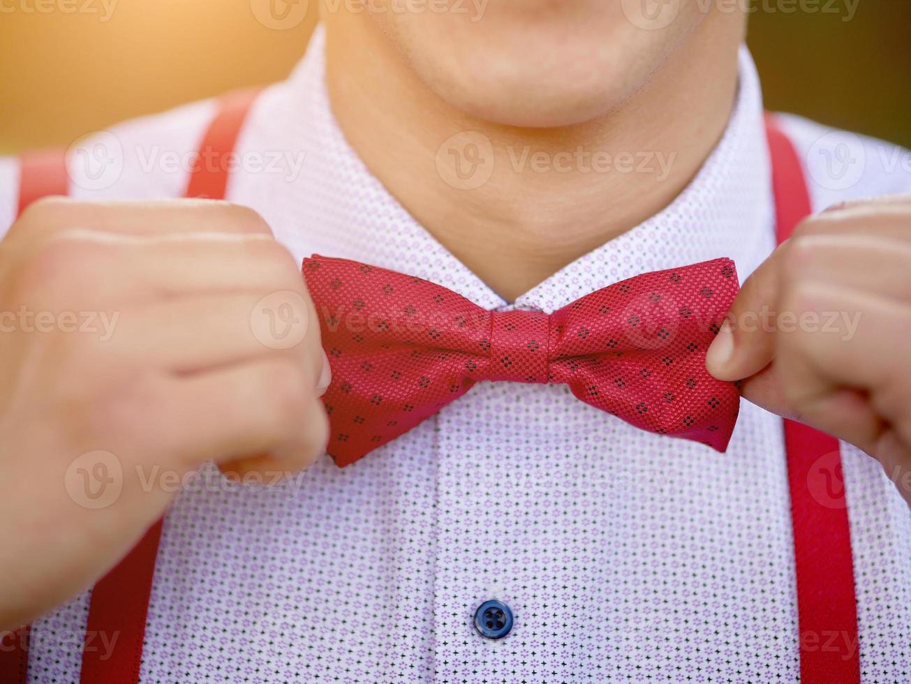 stylish red men's butterfly closeup photo