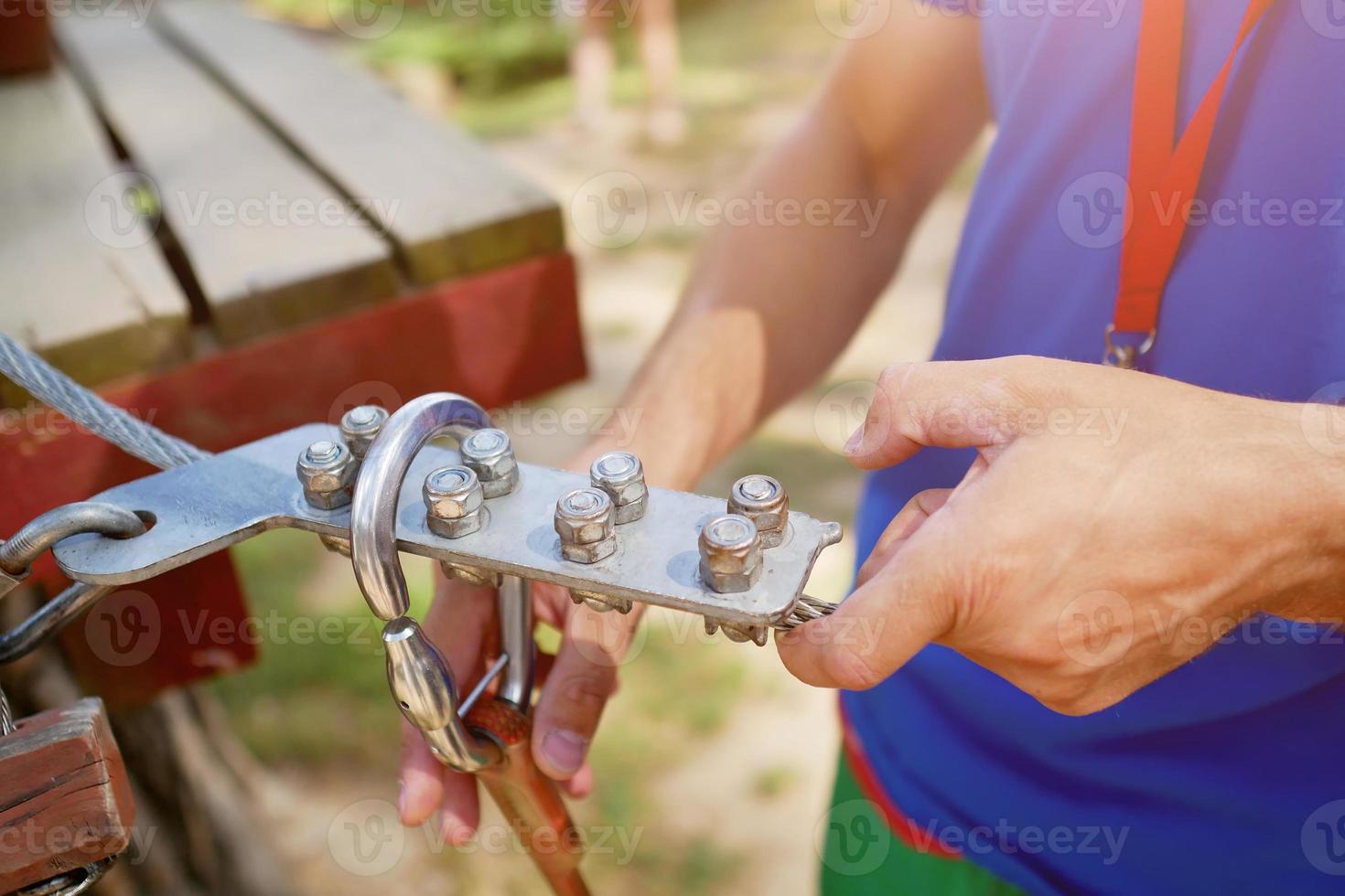 climbing equipment in the hands of the instructor close-up photo