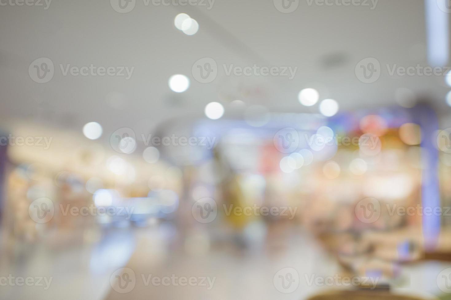 Abstract bokeh and blur beautiful luxury shopping mall and retails store interior for background. Business background. photo