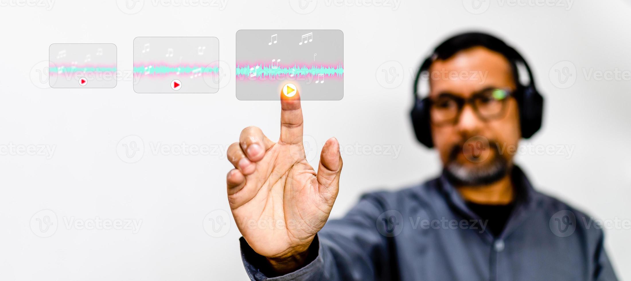 Sound engineers are selecting and playing music to check the sound quality. Concept for entertaining, games, movies, dramas. Men wear headphones. Closeup, Selective focus, copy space, white background photo