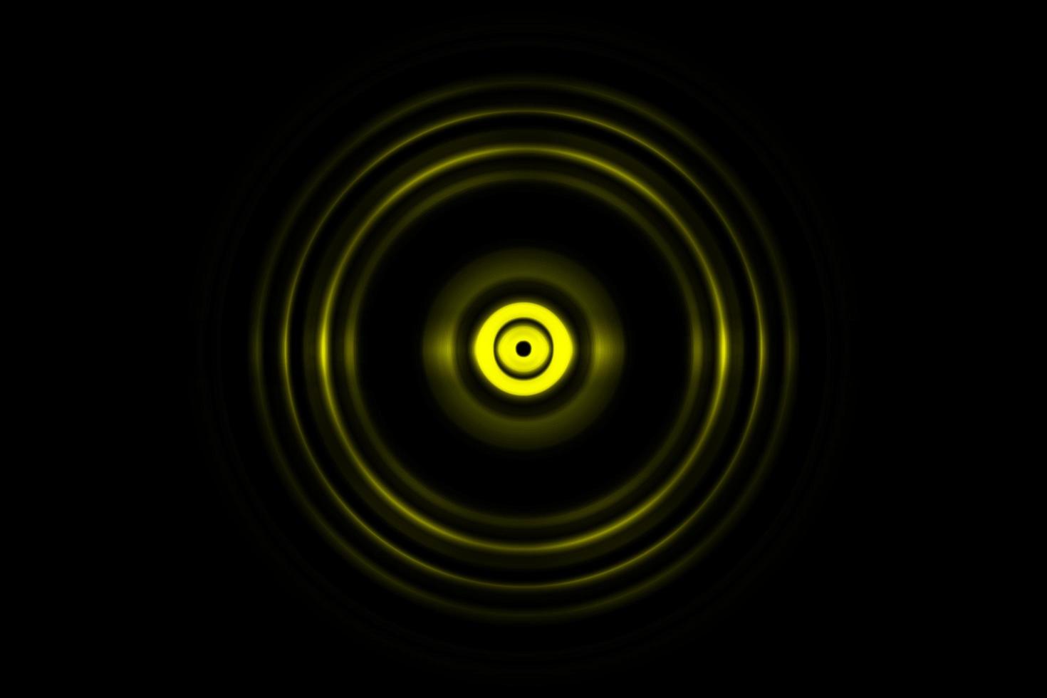 Abstract glowing circle yellow light effect with sound waves oscillating background photo