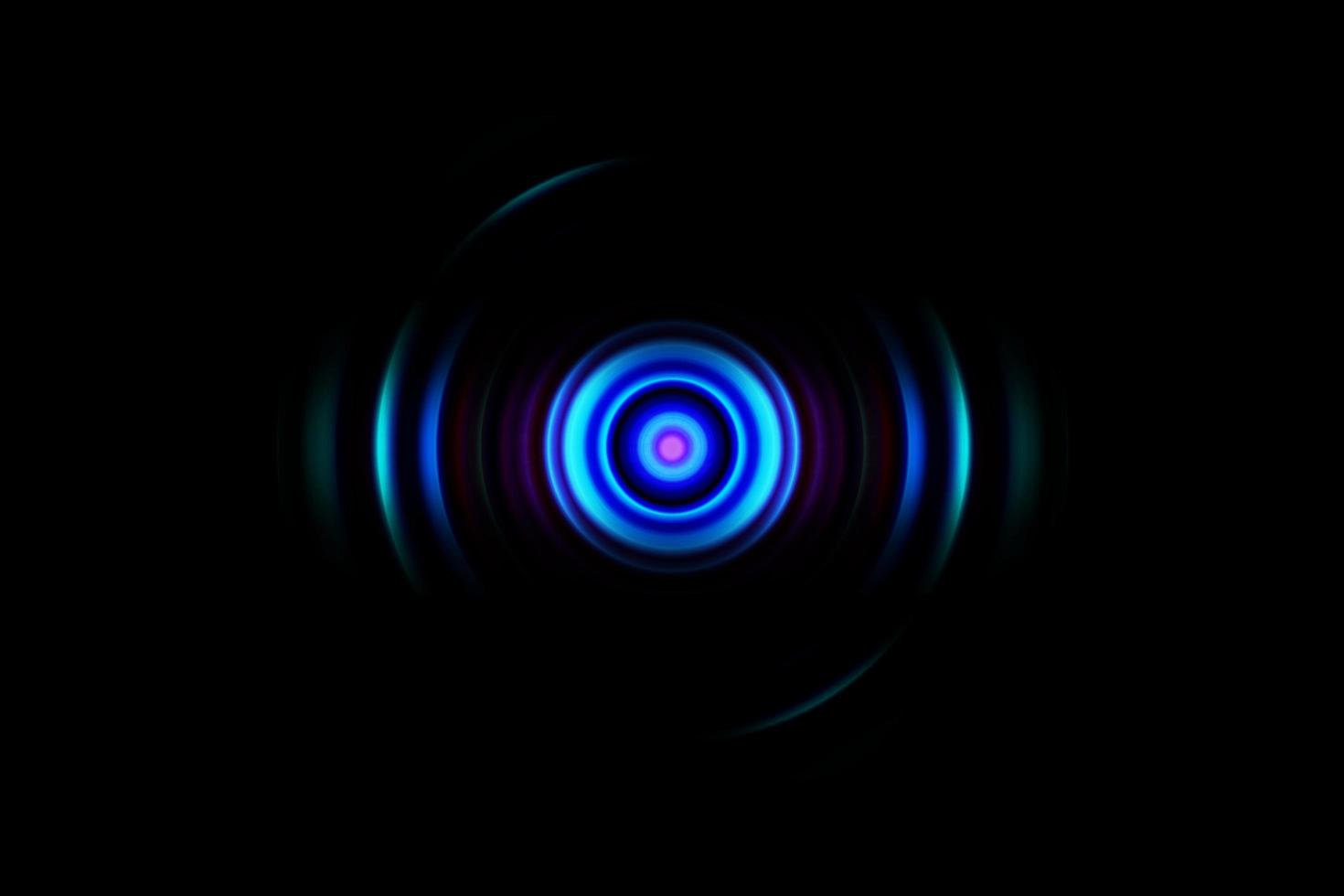 Abstract glowing circle blue light effect on black background photo