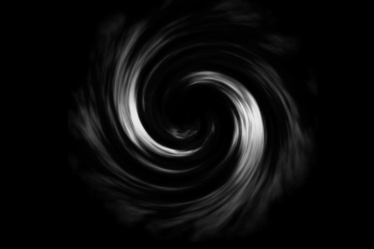 Abstract spiral fog on black background photo