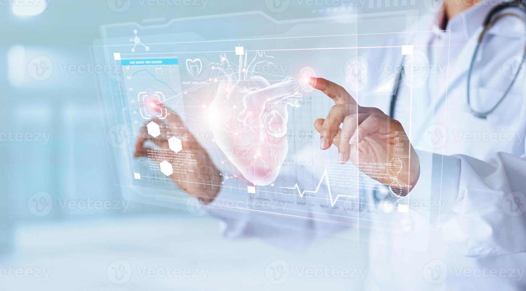 Medicine doctor and stethoscope touching icon heart and diagnostics analysis medical on modern virtual screen interface network connection. Medical technology diagnostics of heart  concept photo