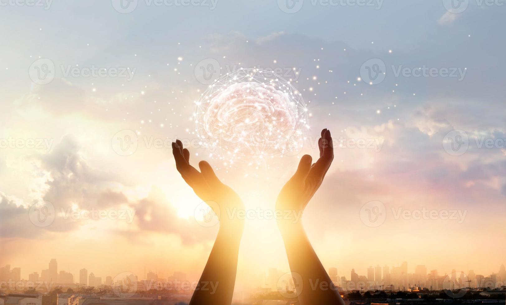 Abstract palm hands touching brain with network connections, innovative technology in science and communication, concept photo