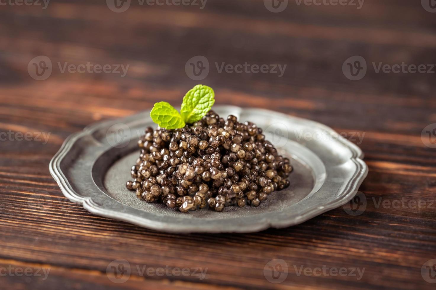 Black caviar plate photo