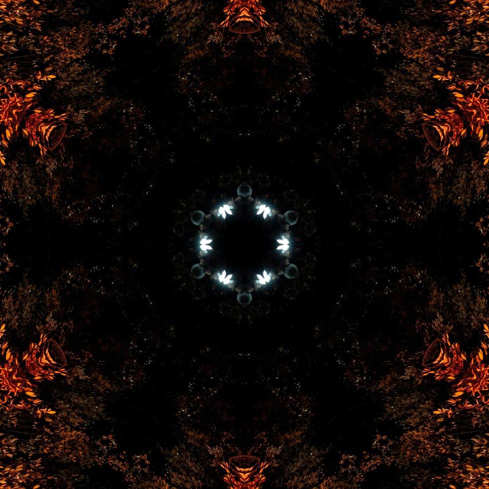Abstract background. Burning flames kaleidoscope pattern. Free Photo