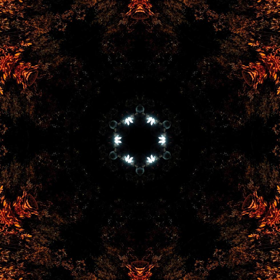 Abstract background. Burning flames kaleidoscope pattern. Free Photo