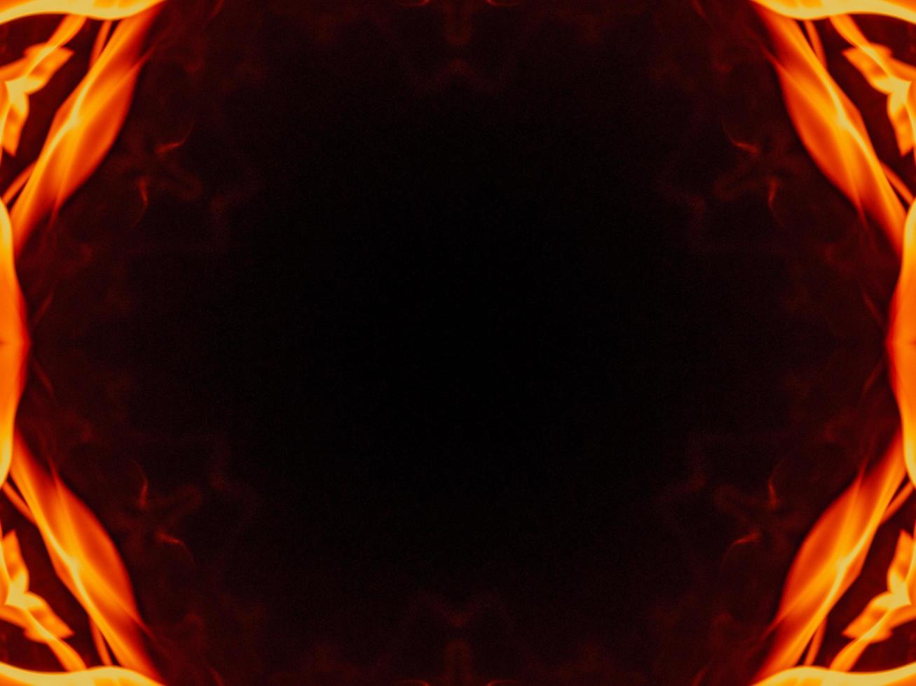 Unique abstract background. Orange flames kaleidoscope pattern. Free Photo