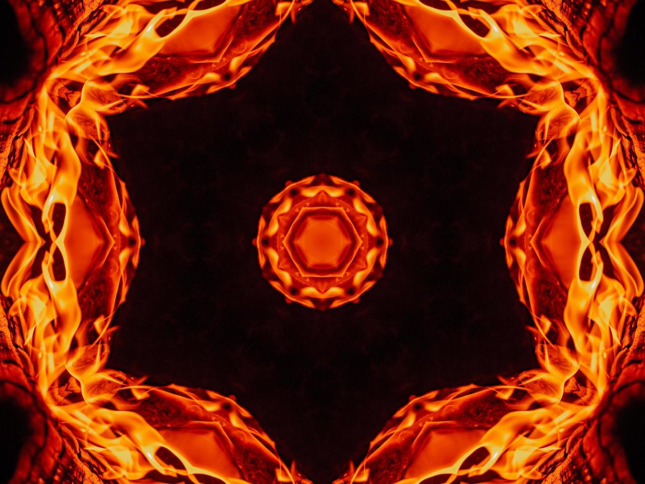Unique abstract background. Orange flames kaleidoscope pattern. Free Photo