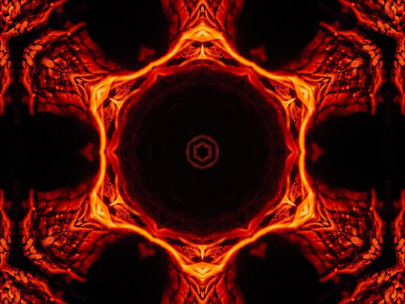 fondo abstracto único. patrón de caleidoscopio de llamas naranjas. foto gratis