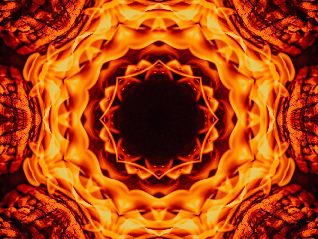 Unique abstract background. Orange flames kaleidoscope pattern. Free Photo