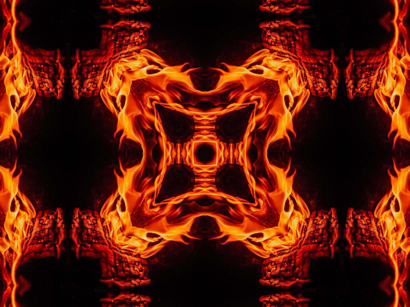 Unique abstract background. Orange flames kaleidoscope pattern. Free Photo