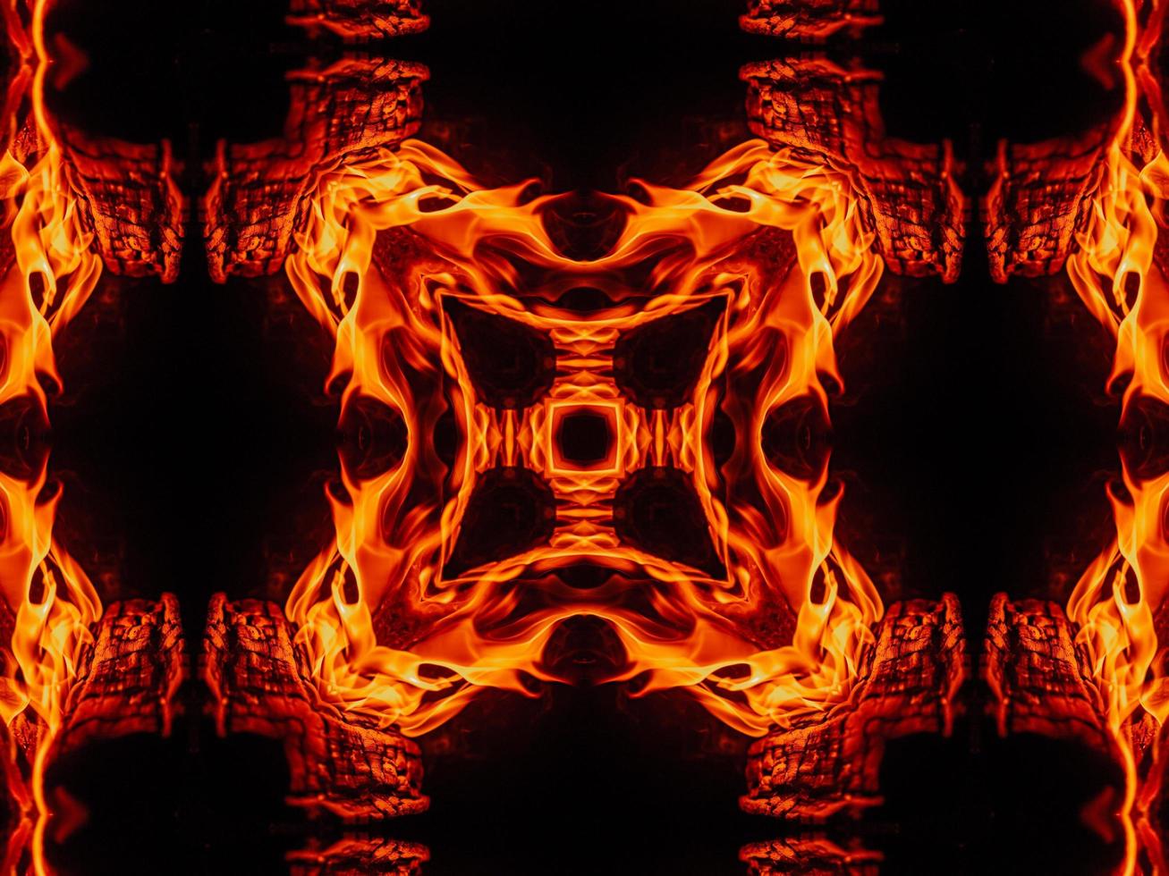 Unique abstract background. Orange flames kaleidoscope pattern. Free Photo