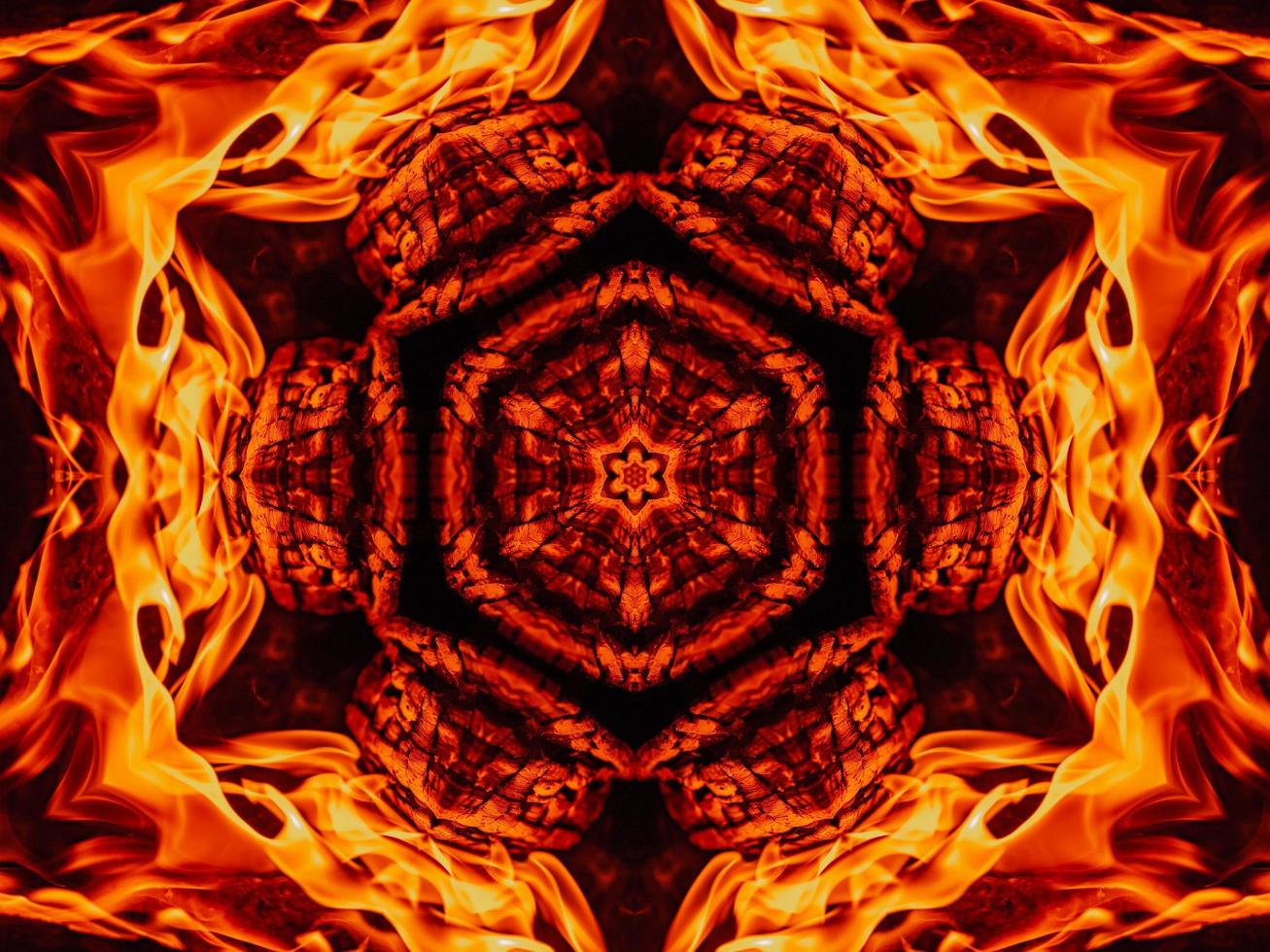 Unique abstract background. Orange flames kaleidoscope pattern. Free Photo