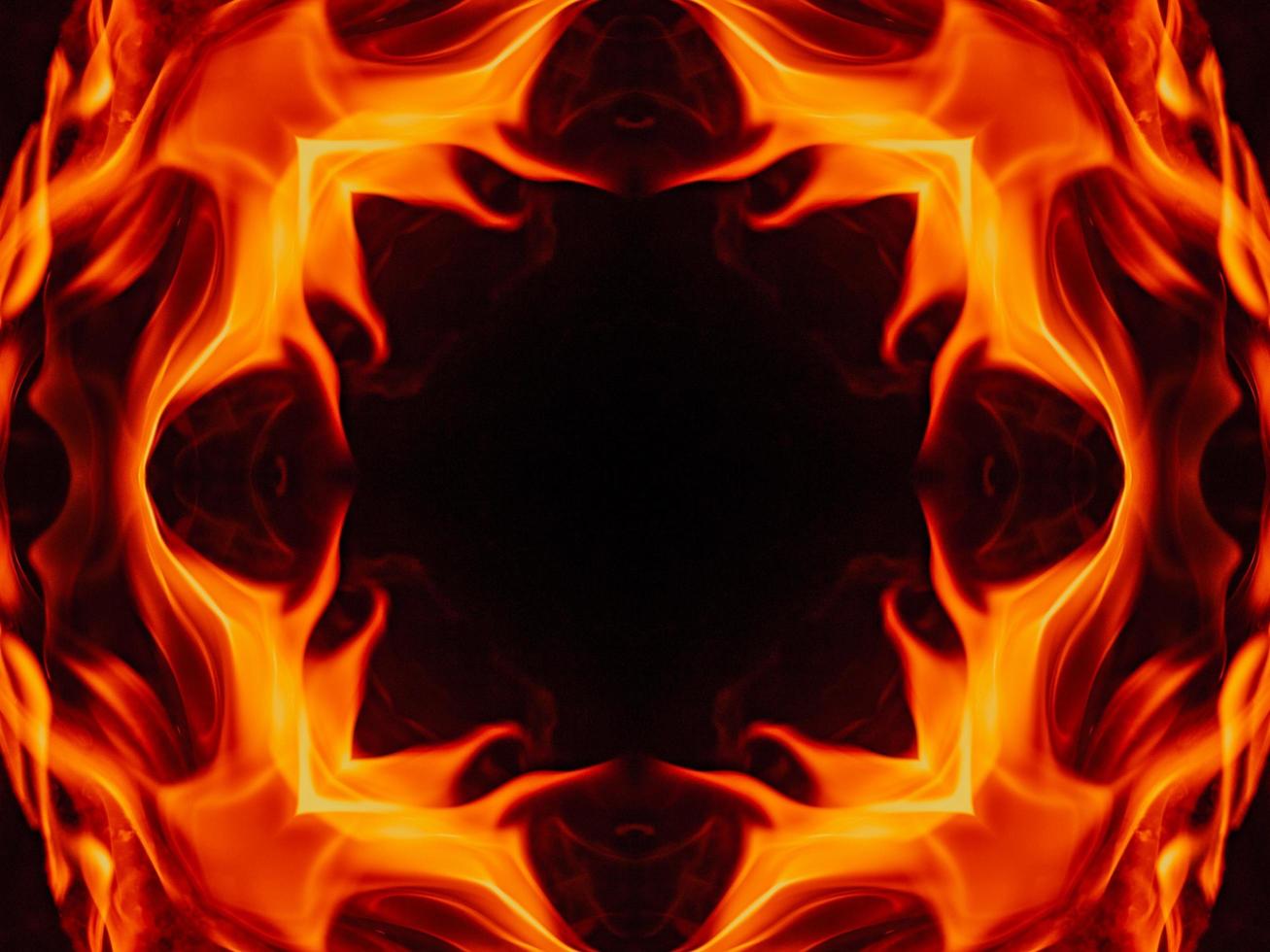 Unique abstract background. Orange flames kaleidoscope pattern. Free Photo
