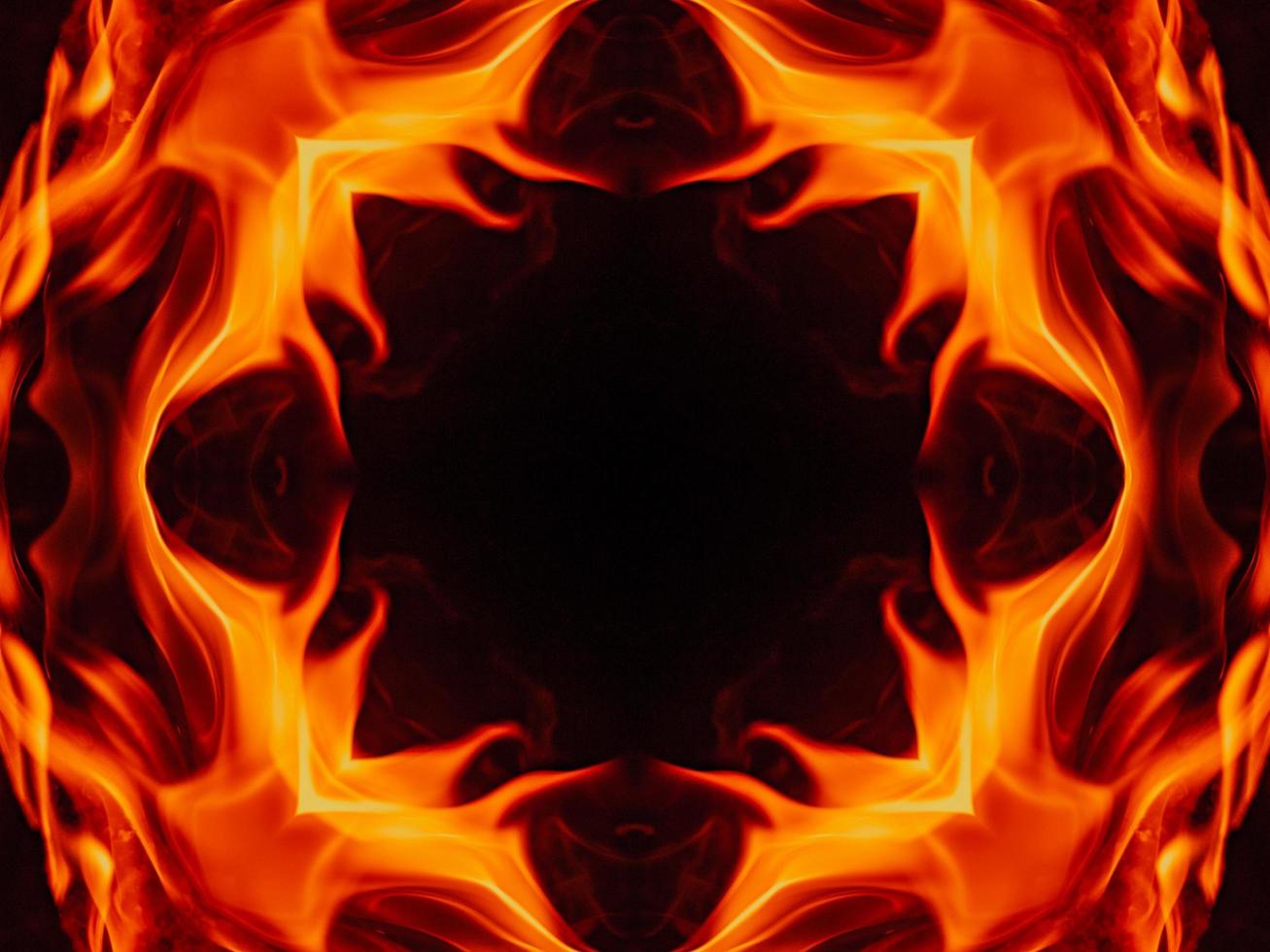 Unique abstract background. Orange flames kaleidoscope pattern. Free Photo