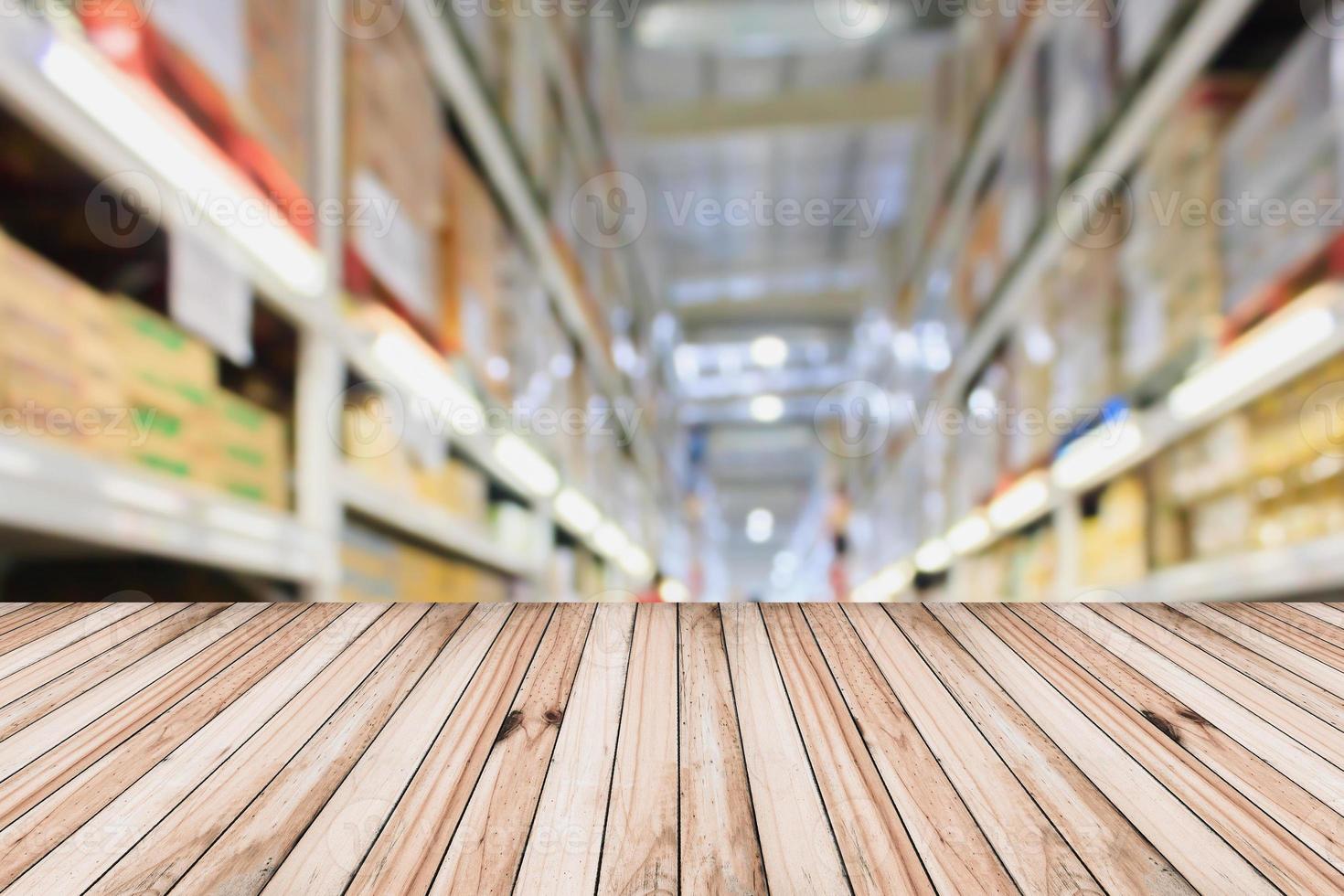 Rows of shelves with boxes in modern warehouse interior photo