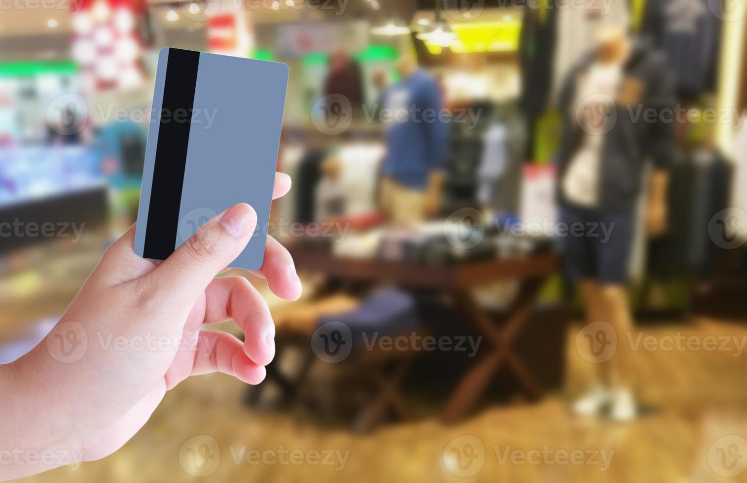 Female hand holding credit card photo