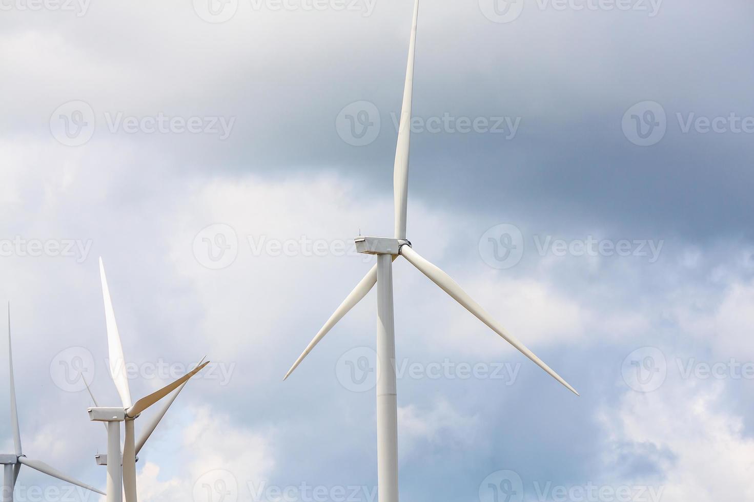 Wind turbines with the clouds and sky photo