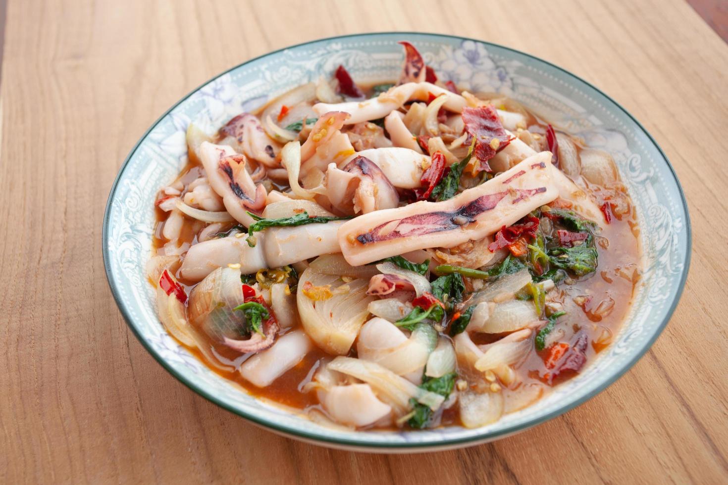 Street Food In Thailand, Stir Fried Squid with Basil photo