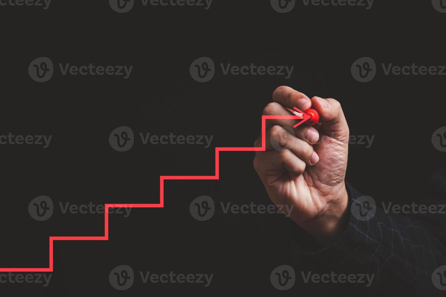 Hand writing step by red pen for next step and progressive concept. photo