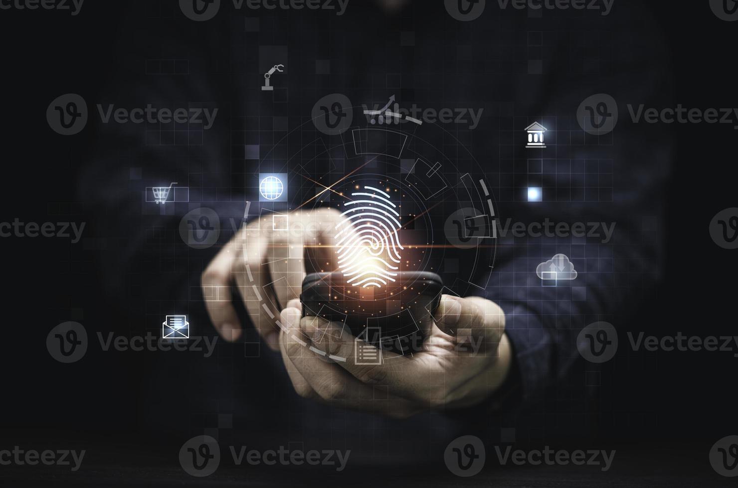 Businessman holding smartphone and fingerprint  touching mobile phone for access to mobile phone , Technology security concept. photo