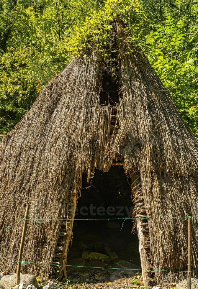 Replica of house from Mesolithic Iron Gates culture of the Balkans in Lepenski Vir, Serbia photo