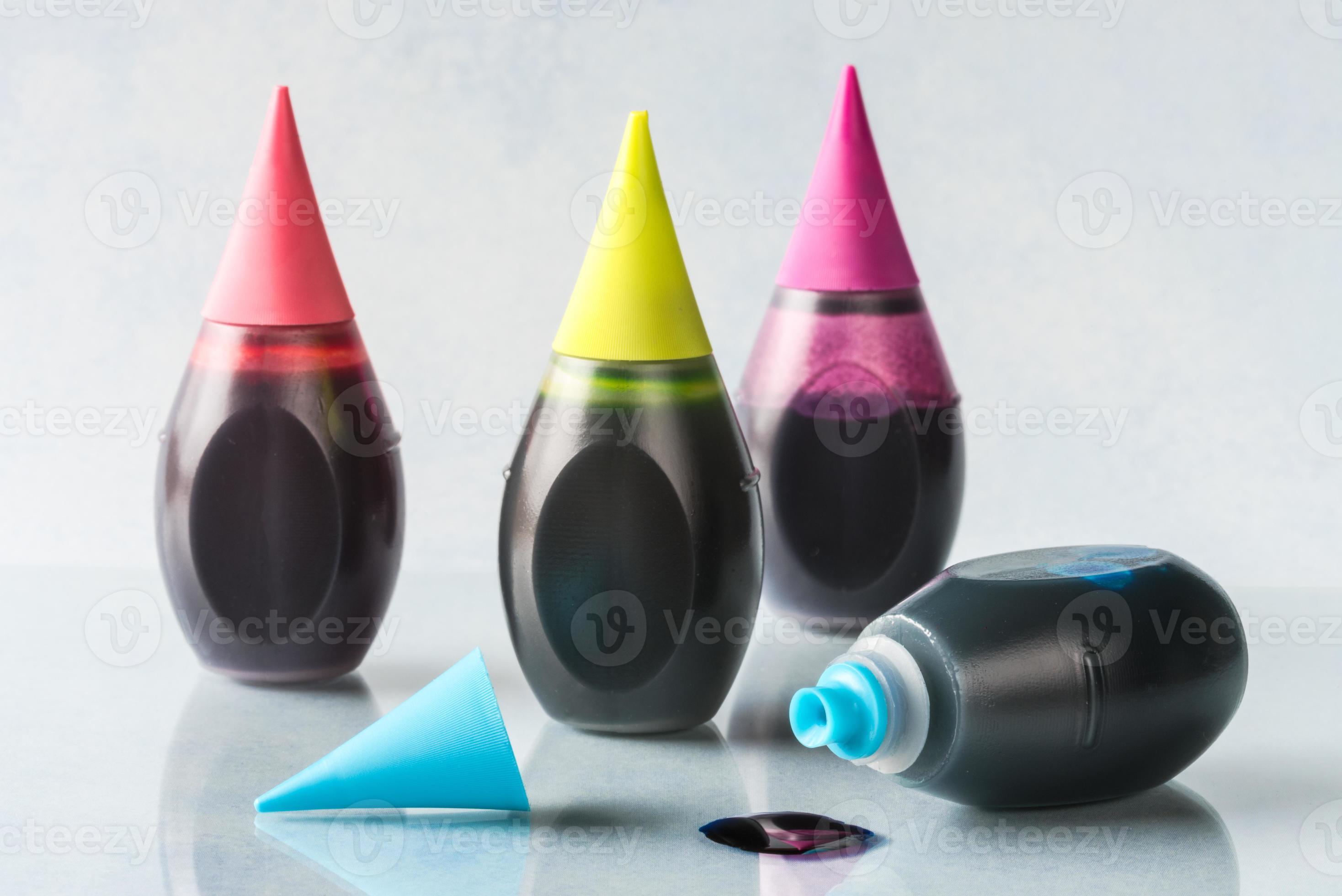 Four Bottles of Food Coloring 6969974 Stock Photo at Vecteezy