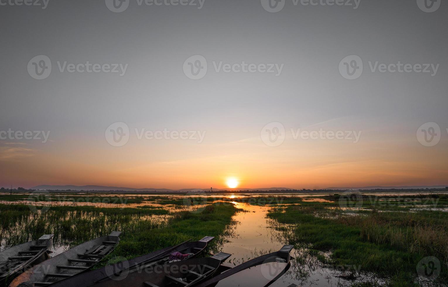 sunrise on small lek in Thailand photo