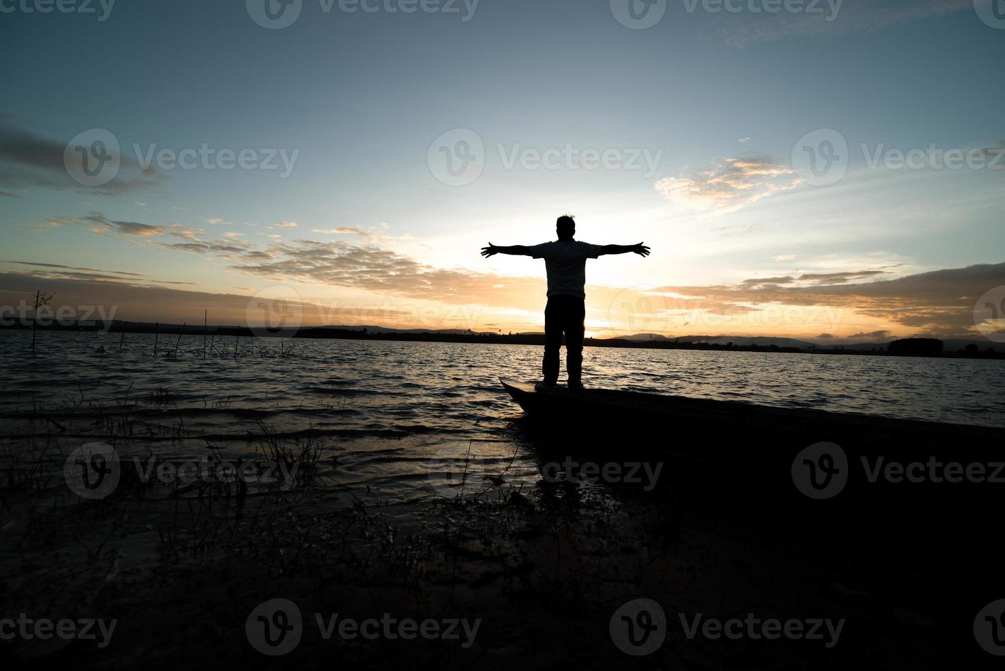 standing on old fishing boat photo