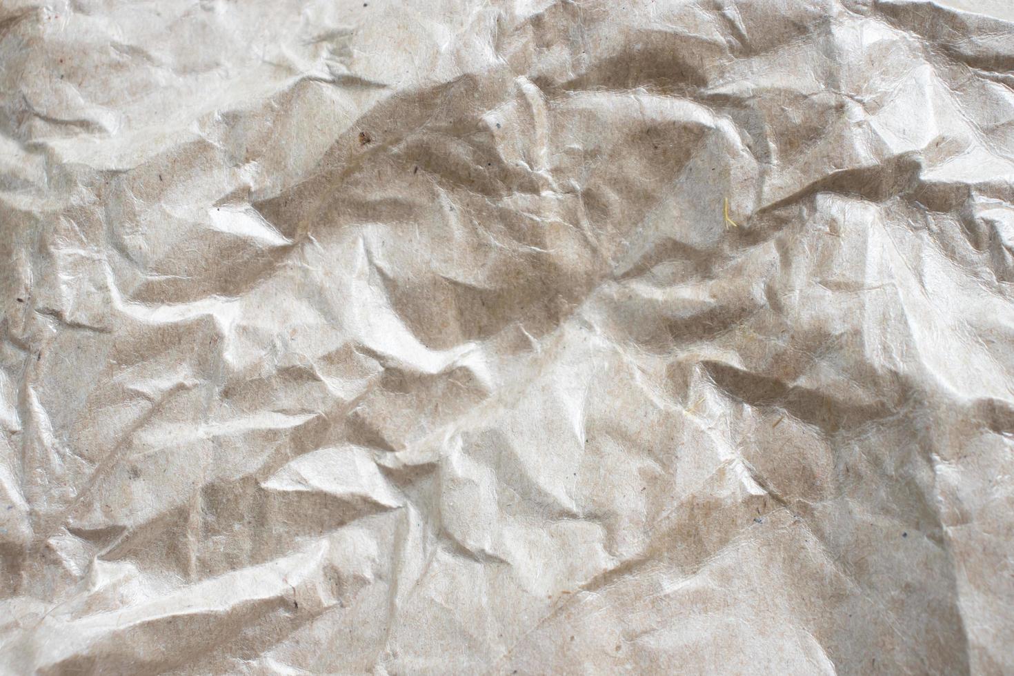 the surface structure of the oil paper crumpled to form an abstract pattern photo