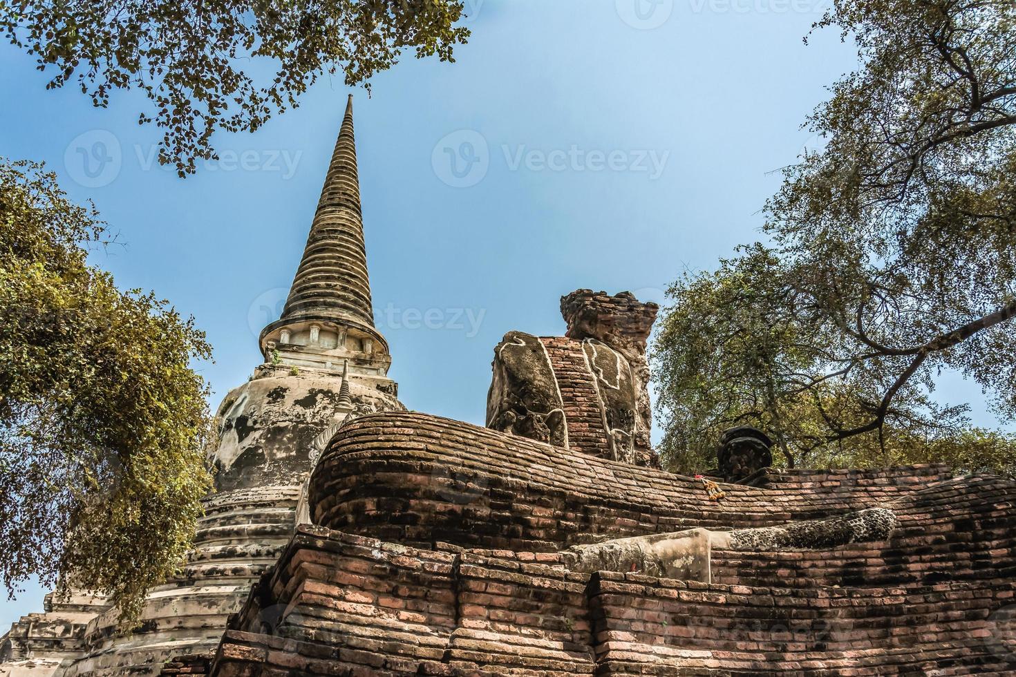 THAILAND Ruins and Antiques at the Ayutthaya Historical Park Tourists from around the world Buddha decay photo