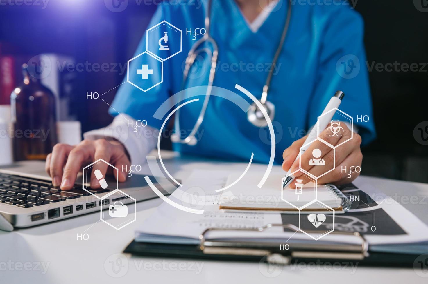 medical technology concept,smart doctor hand working with modern laptop computer with virtual icon diagram photo