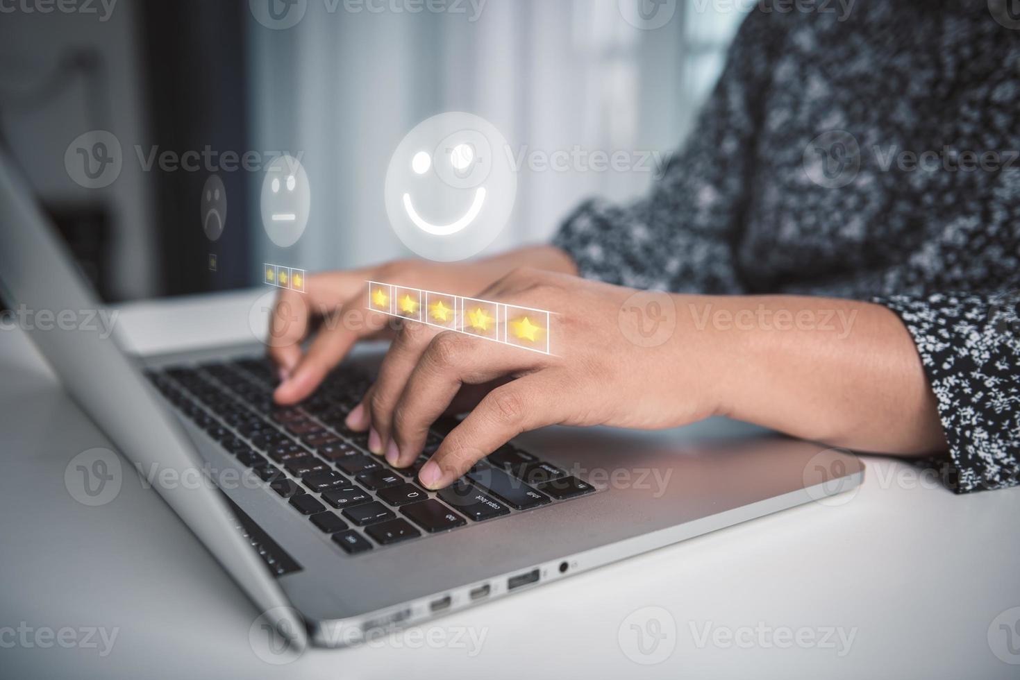 Customer Survey Feedback and Satisfaction Service Concept. Woman's Hands is Choosing Rate of Satisfaction Evaluation for Customers Service. Product Questionnaire for Customer Satisfied Feedback. photo