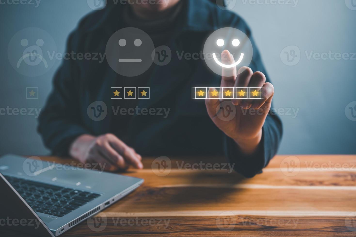 Customer Survey Feedback and Satisfaction Service Concept. Woman's Hands is Choosing Rate of Satisfaction Evaluation for Customers Service. Product Questionnaire for Customer Satisfied Feedback. photo