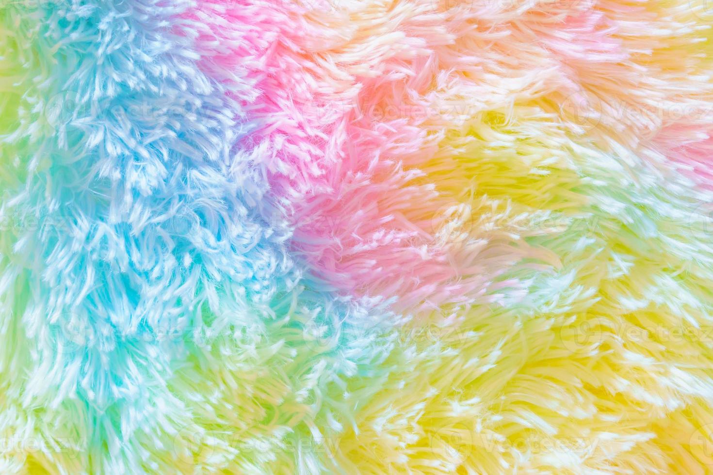 Beautiful multicolored carpets with a fur texture. photo