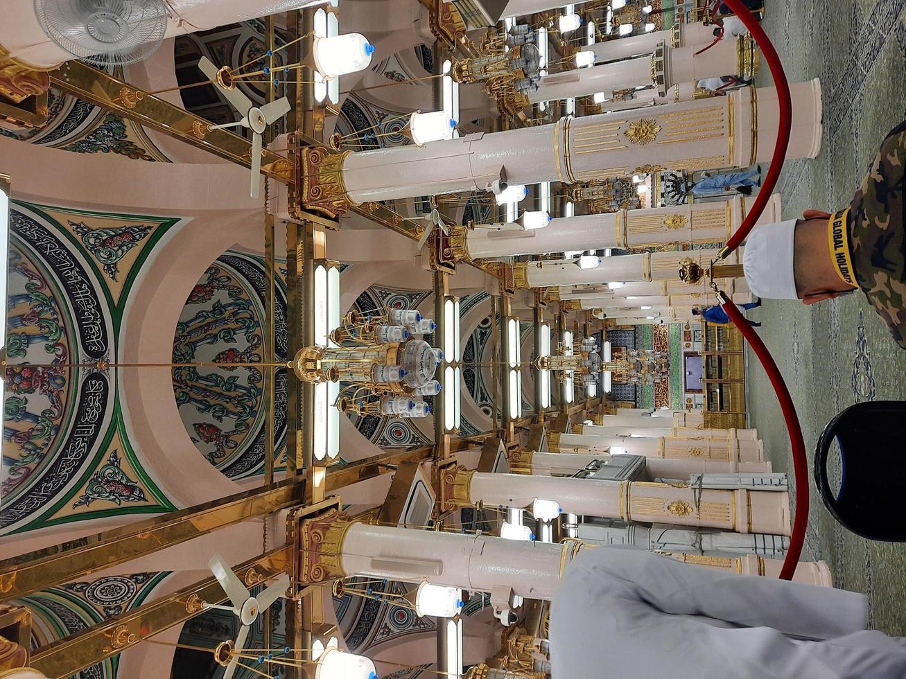 Madinah, Saudi Arabia, Dec 2021 - Visitors from all over the world are busy remembering Allah in different parts of Prophets Mosque Madinah. photo