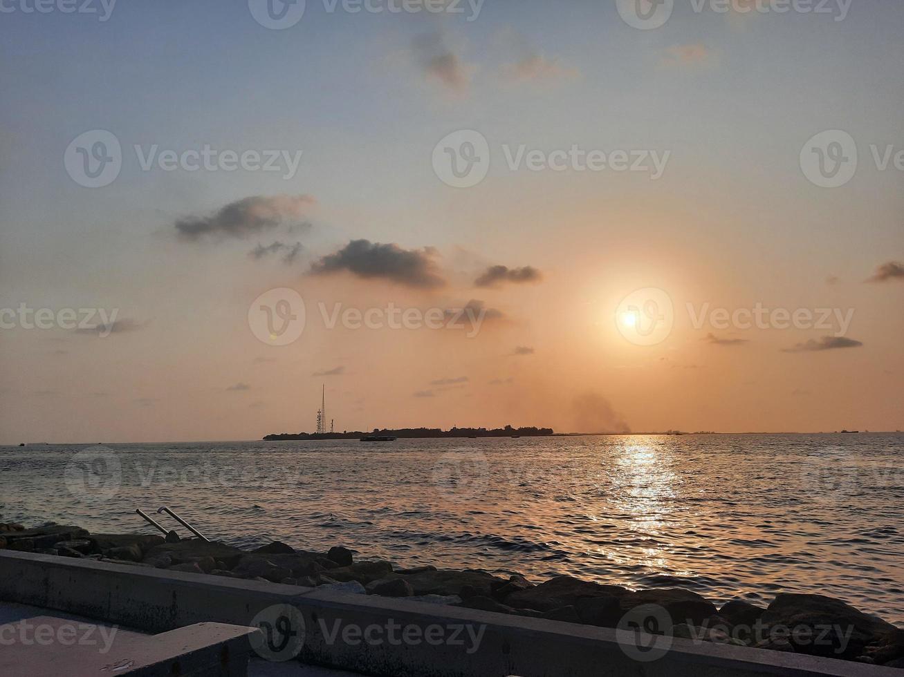 Beautiful Sunset at Male Beach, Maldives photo