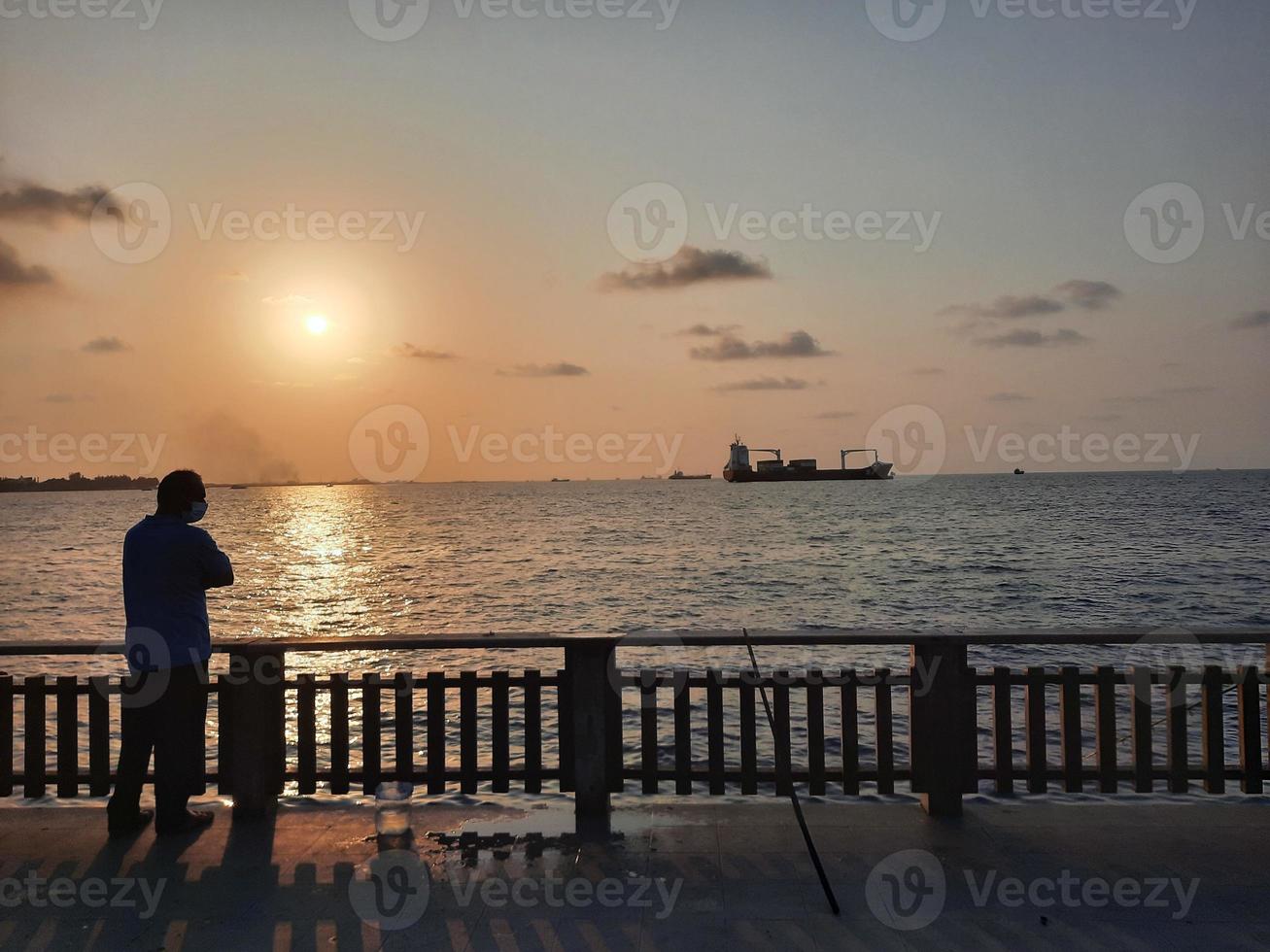 Beautiful Sunset at Male Beach, Maldives photo