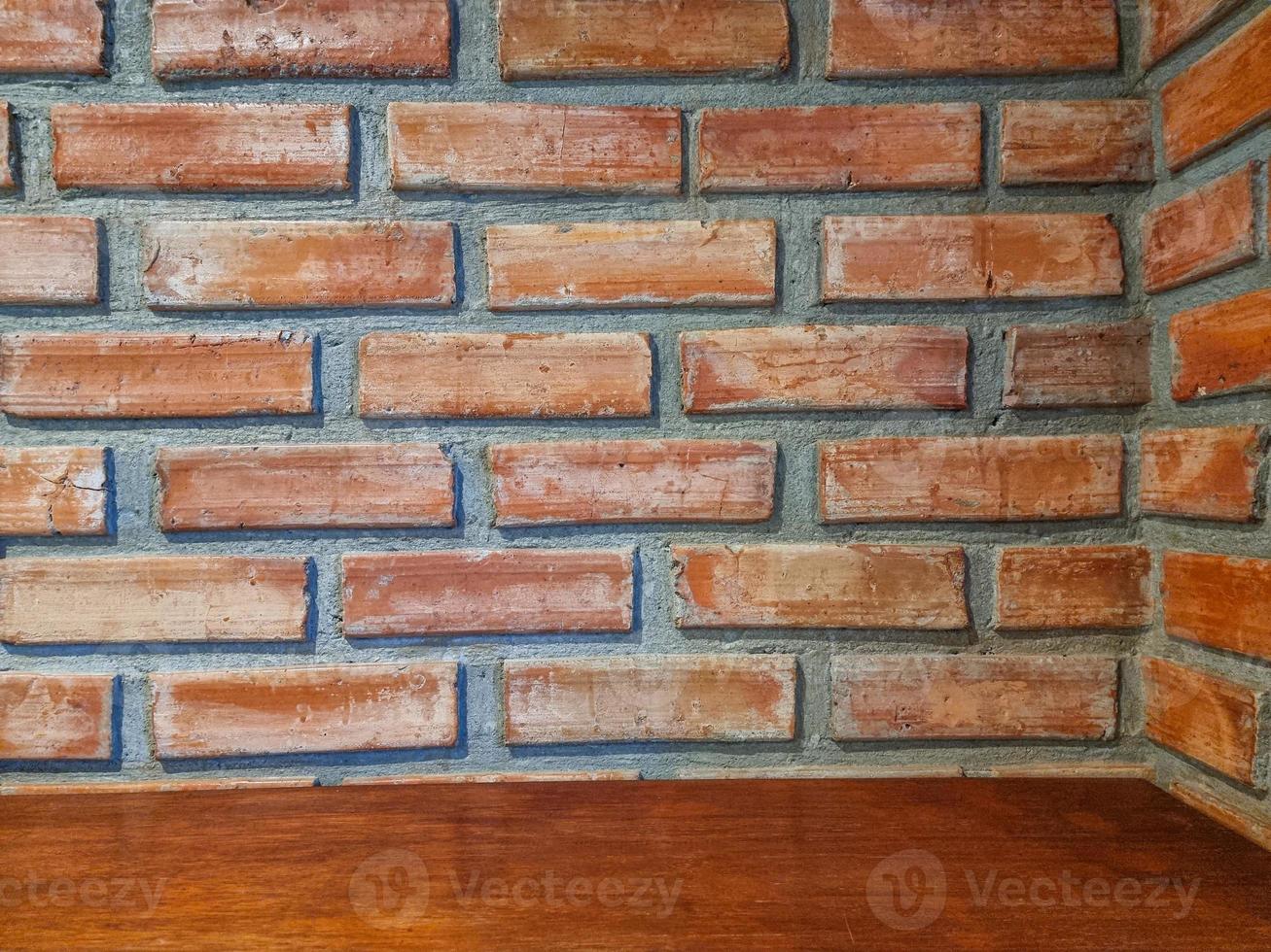 orange square shelf brick block on cement wall textured and background. strong interiors house building. photo