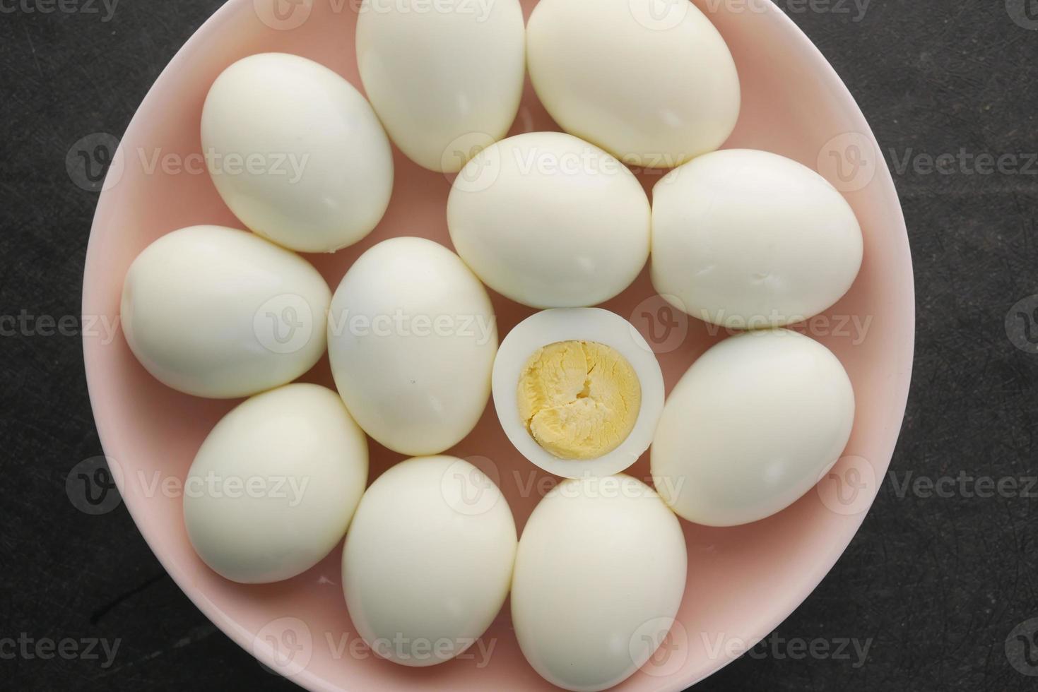 close up of bowel egg in a bowl on table photo