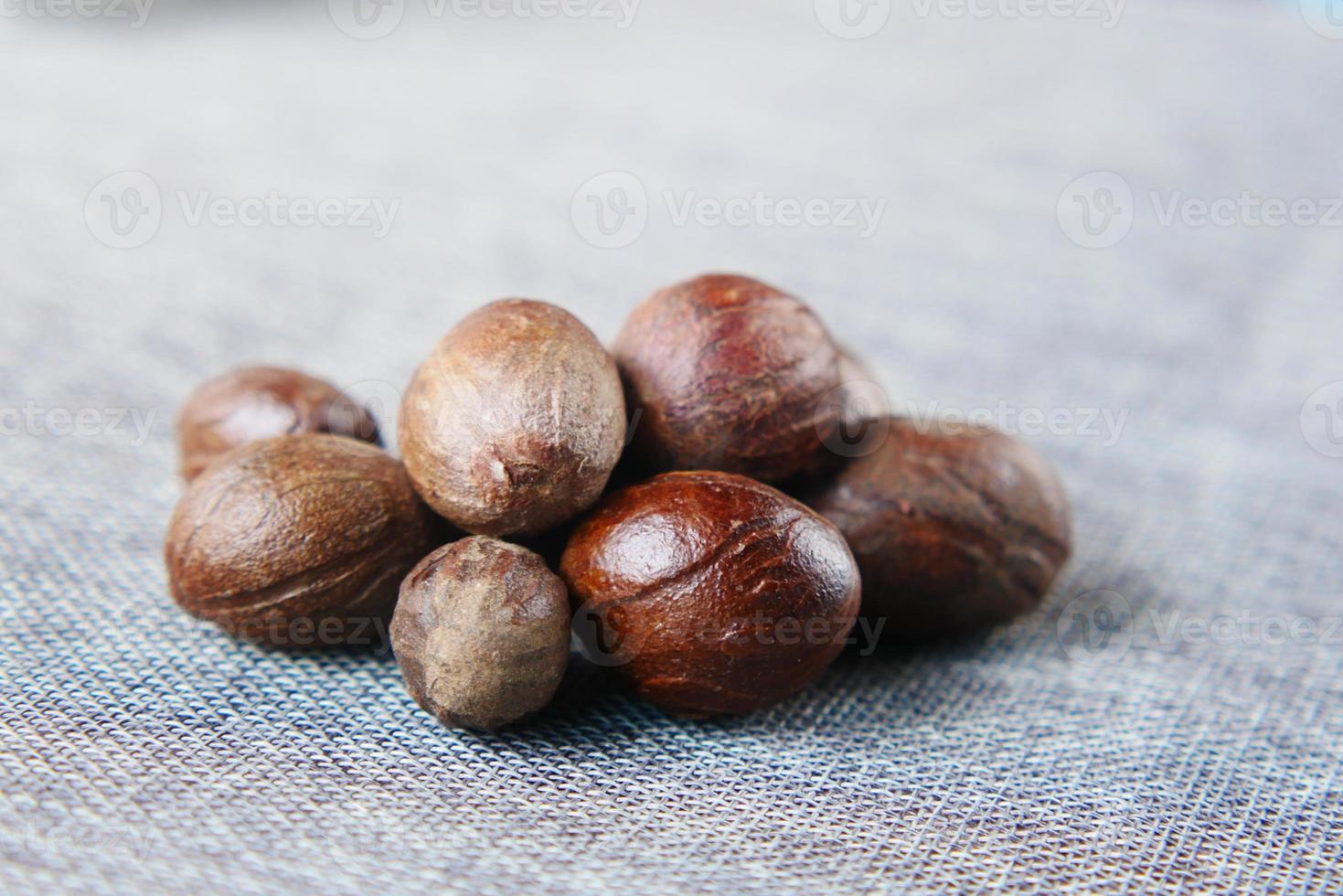 Ground nutmeg on table close up , photo