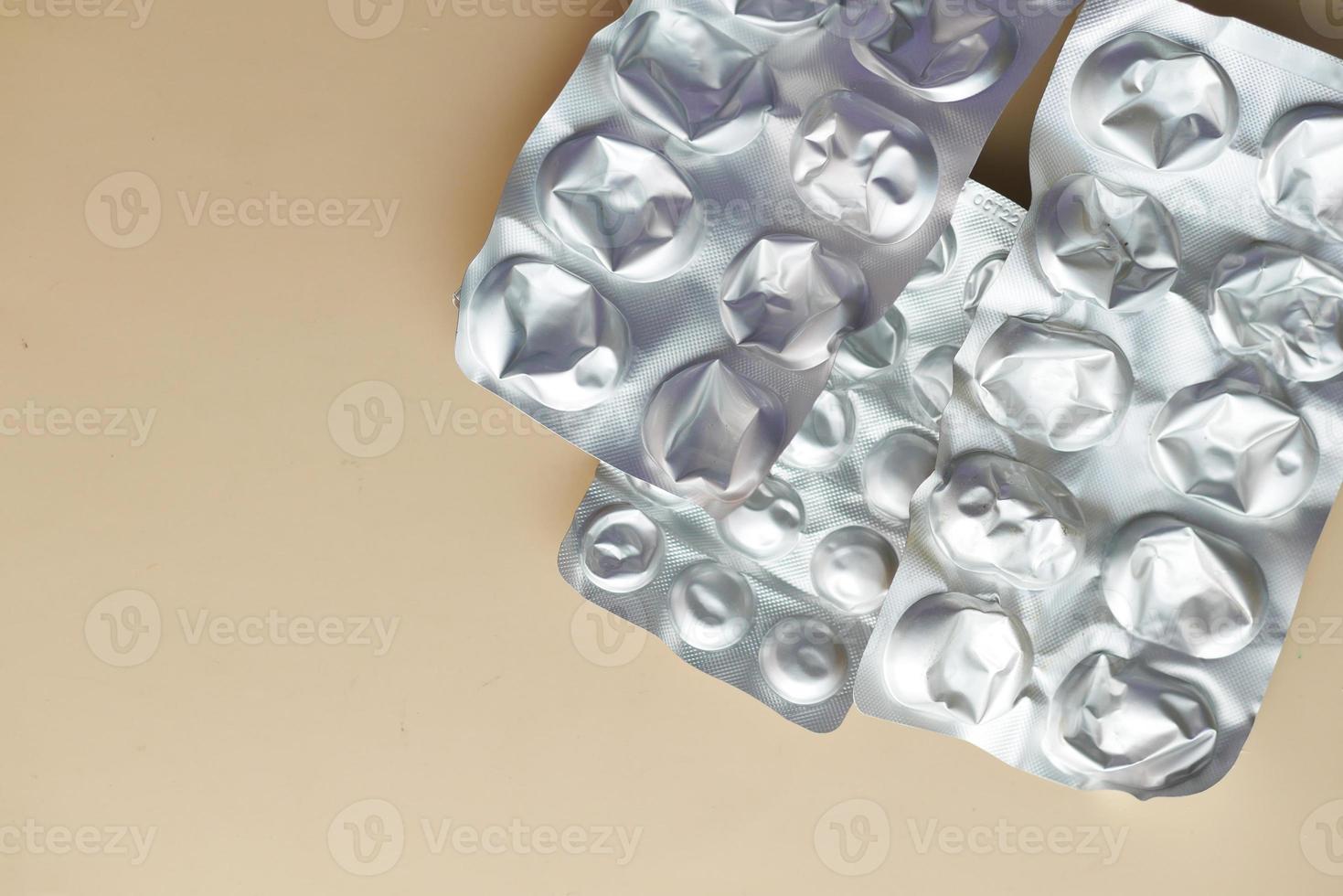 Close up of empty pills of blister pack on table photo