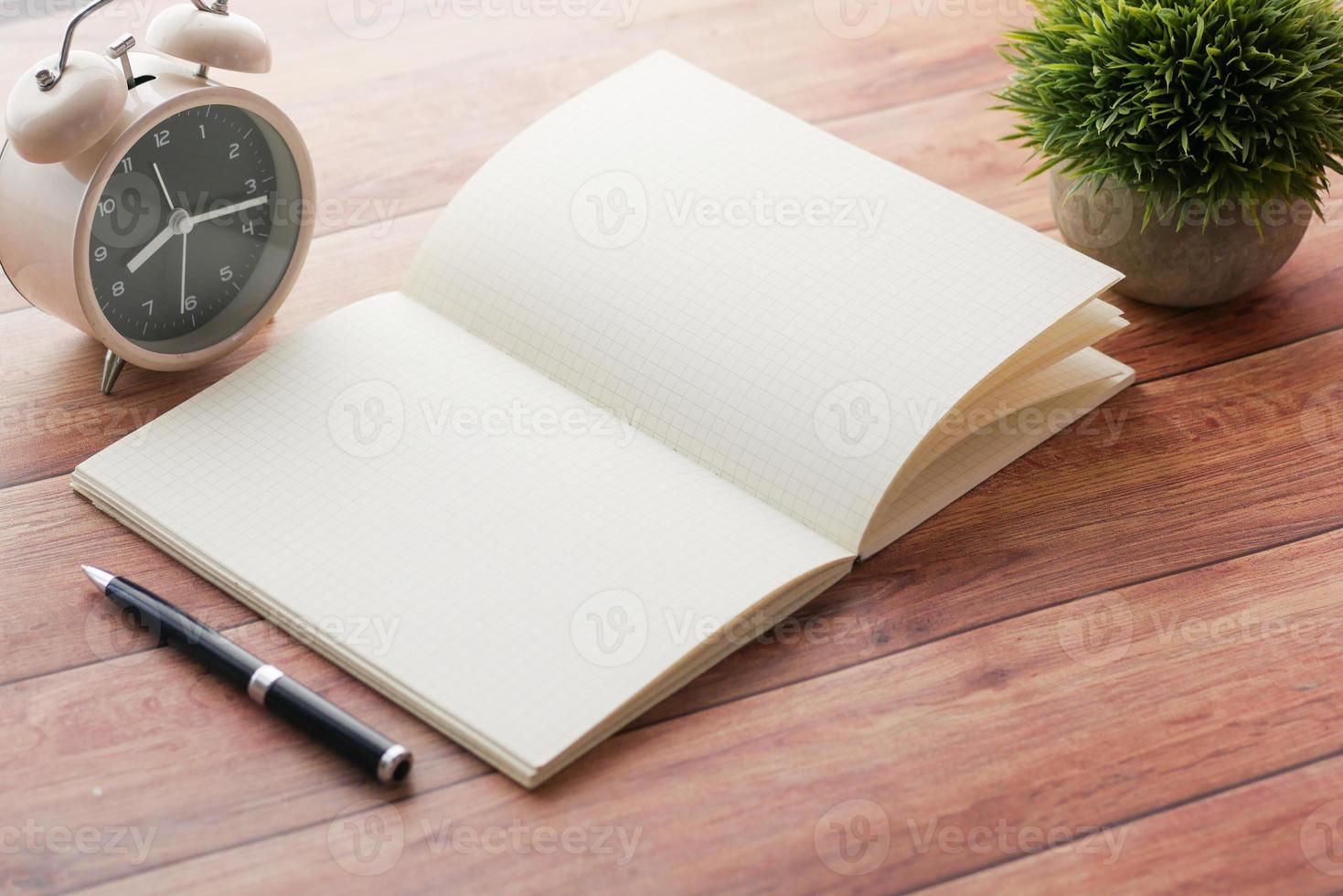 high angle view of open notepad on black background photo