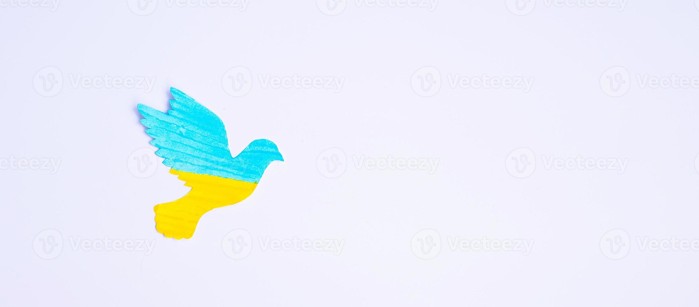 Support for Ukraine in the war with Russia, peace dove with flag of Ukraine. Pray, No war, stop war and stand with Ukraine concepts photo