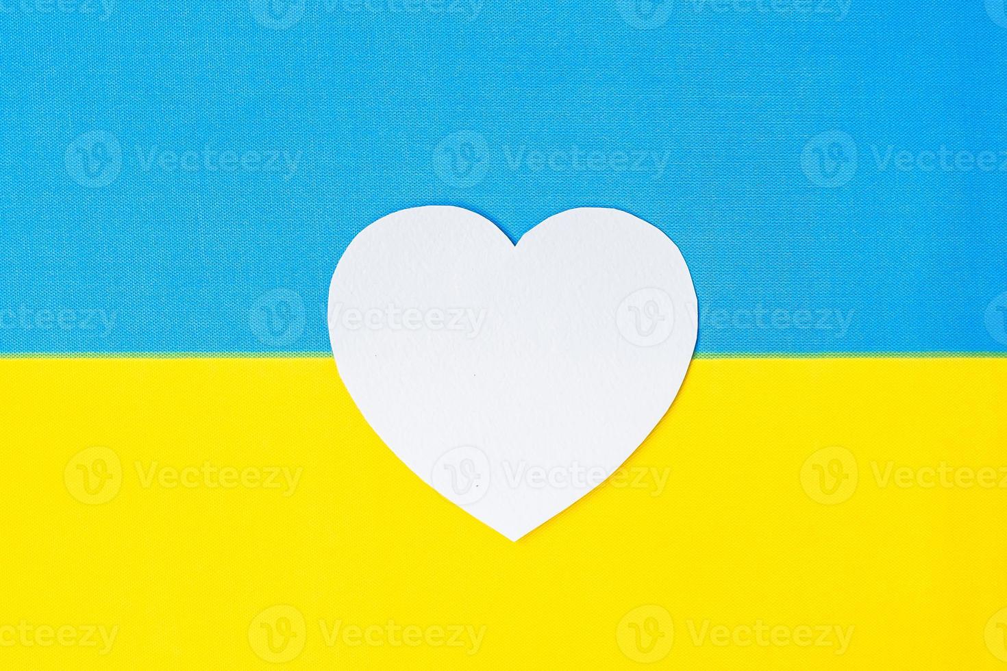 Support for Ukraine in the war with Russia, symbol of Heart with flag of Ukraine. Pray, No war, stop war and  stand with Ukraine photo