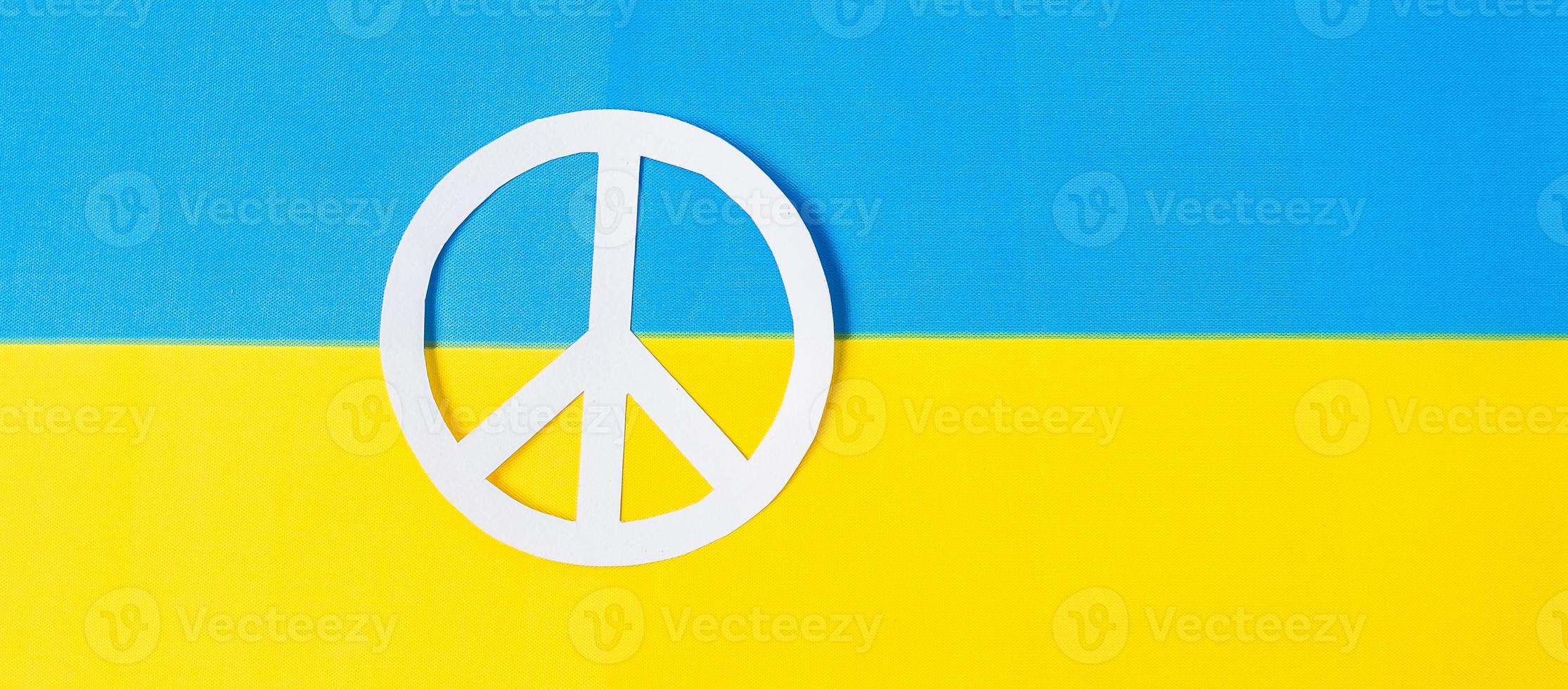 Support for Ukraine in the war with Russia, symbol of peace with flag of Ukraine. Pray, No war, stop war, stand with Ukraine and Nuclear Disarmament photo